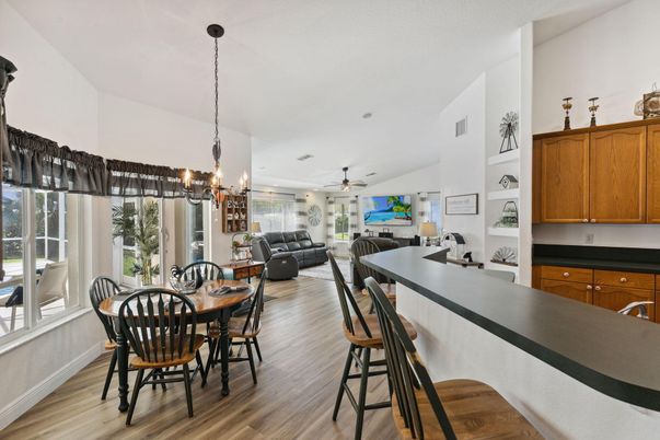 Dining room, Interior, Living room, Pendant Lights, Recessed Lighting, Wood Texture Flooring