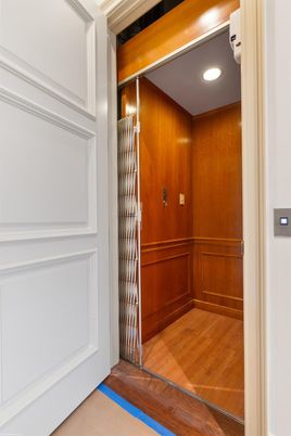 Elevator, Interior, Recessed Lighting, Wood Texture Flooring, Wooden Walls