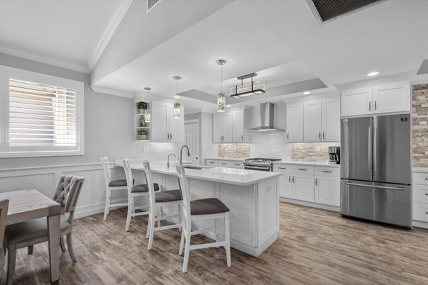 Interior, Kitchen, Pendant Lights, Recessed Lighting, Stainless Steel Appliances, Wood Texture Flooring