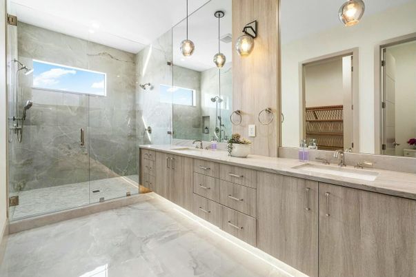 Bathroom, Dual Sink Vanities, Glass Shower, Interior, Marble, Marble Walls, Pendant Lights