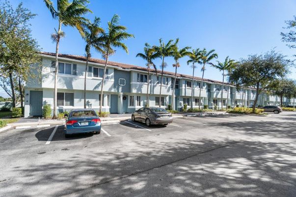 Attached, Exterior, Facade, Condo Building