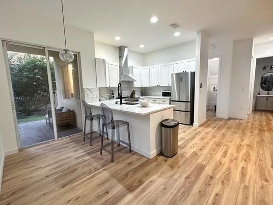 Interior, Kitchen, Pendant Lights, Recessed Lighting, Stainless Steel Appliances, Wood Texture Flooring