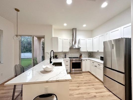 Interior, Kitchen, Pendant Lights, Recessed Lighting, Stainless Steel Appliances, Wood Texture Flooring