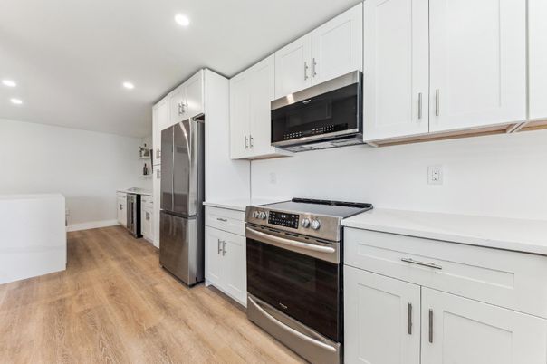 Interior, Kitchen, Recessed Lighting, Stainless Steel Appliances, Wood Texture Flooring