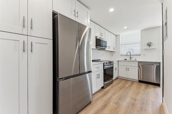 Interior, Kitchen, Recessed Lighting, Stainless Steel Appliances, Wood Texture Flooring