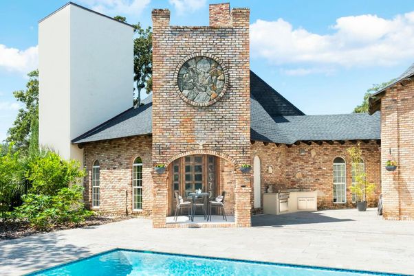 Exterior, Facade, Brick Facade, Pool, Brick Traditional