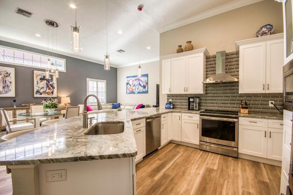 Dining room, Interior, Kitchen, Pendant Lights, Recessed Lighting, Stainless Steel Appliances, Wood Texture Flooring
