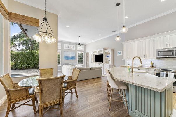 Dining room, Interior, Kitchen, Living room, Pendant Lights, Recessed Lighting, Stainless Steel Appliances, Wood Texture Flooring