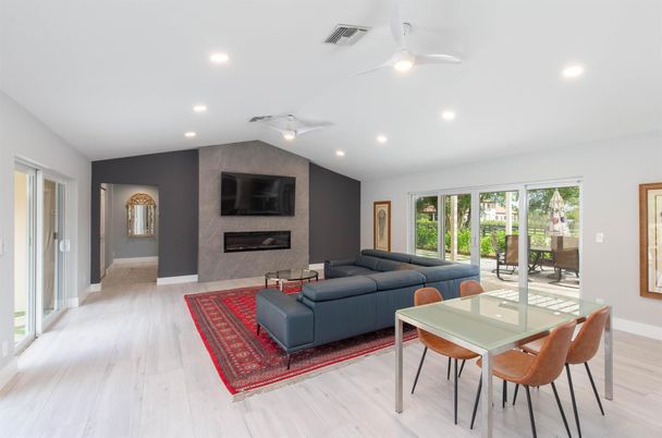 Dining room, Fireplace, Interior, Living room, Recessed Lighting, Wood Texture Flooring