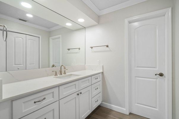 Bathroom, Dual Sink Vanities, Interior, Recessed Lighting, Wood Texture Flooring