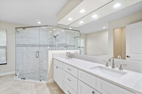 Bathroom, Dual Sink Vanities, Glass Shower, Interior, Marble Walls, Recessed Lighting