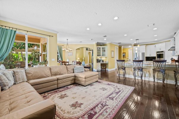 Chandelier, Dining room, Interior, Kitchen, Living room, Pendant Lights, Recessed Lighting, Wood Texture Flooring