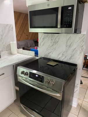 Interior, Kitchen, Marble Walls, Stainless Steel Appliances