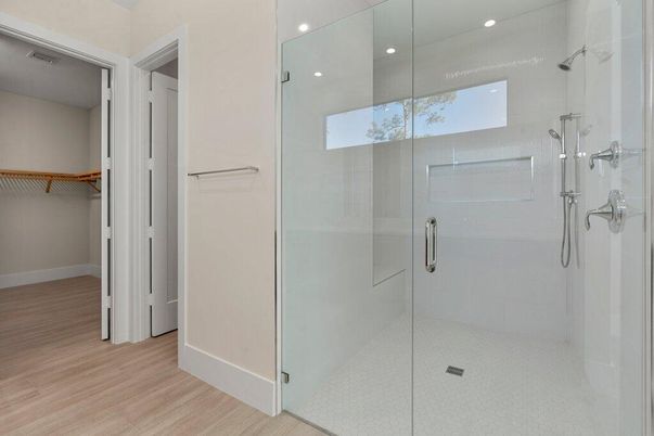 Bathroom, Glass Shower, Interior, Recessed Lighting, Walk-in Closets, Wood Texture Flooring