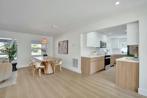 Dining room, Interior, Kitchen, Pendant Lights, Recessed Lighting, Stainless Steel Appliances, Wood Texture Flooring
