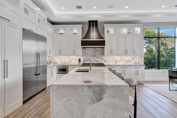Interior, Kitchen, Marble Walls, Recessed Lighting, Stainless Steel Appliances, Wood Texture Flooring