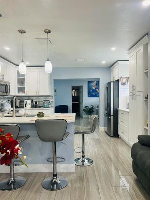 Interior, Kitchen, Pendant Lights, Recessed Lighting, Stainless Steel Appliances, Wood Texture Flooring