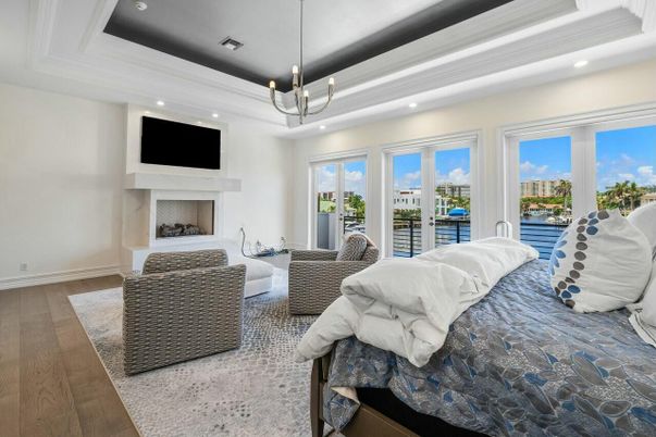 Bedroom, Fireplace, Interior, Living room, Pendant Lights, Recessed Lighting, Wood Texture Flooring