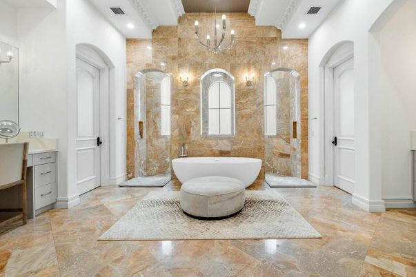 Bathroom, Chandelier, Dual Sink Vanities, Free Standing Baths, Interior, Recessed Lighting, Stone Walls