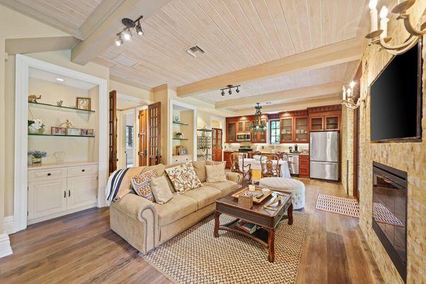 Dining room, Fireplace, Interior, Kitchen, Living room, Recessed Lighting, Stainless Steel Appliances, Wood Texture Flooring