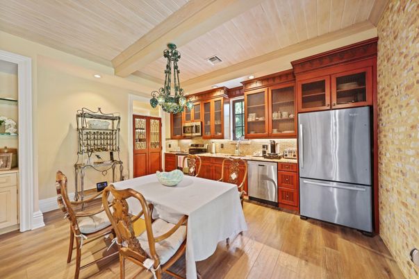 Dining room, Interior, Kitchen, Pendant Lights, Recessed Lighting, Stainless Steel Appliances, Wood Texture Flooring