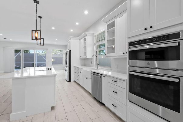 Interior, Kitchen, Pendant Lights, Recessed Lighting, Stainless Steel Appliances, Wood Texture Flooring