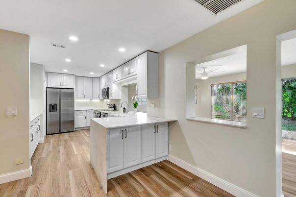 Interior, Kitchen, Recessed Lighting, Stainless Steel Appliances, Wood Texture Flooring