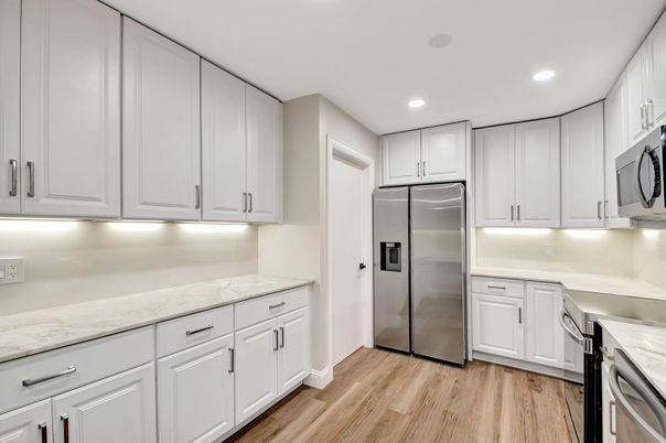 Interior, Kitchen, Recessed Lighting, Stainless Steel Appliances, Wood Texture Flooring