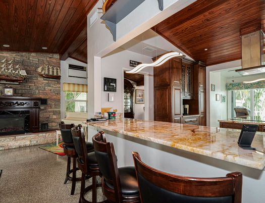 Fireplace, Interior, Kitchen, Recessed Lighting, Stone Walls, Wooden Ceilings