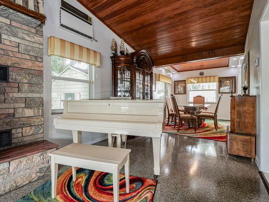 Dining room, Fireplace, Interior, Pendant Lights, Piano, Recessed Lighting, Stone Walls, Wooden Ceilings