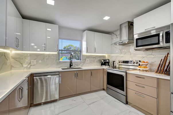 Interior, Kitchen, Marble, Marble Walls, Recessed Lighting, Stainless Steel Appliances