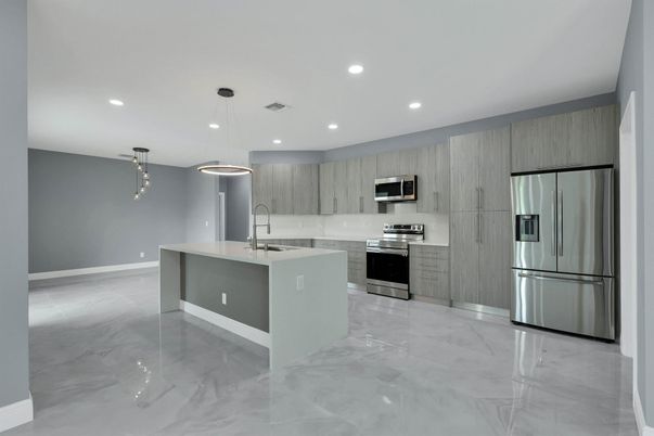 Interior, Kitchen, Marble, Pendant Lights, Recessed Lighting, Stainless Steel Appliances