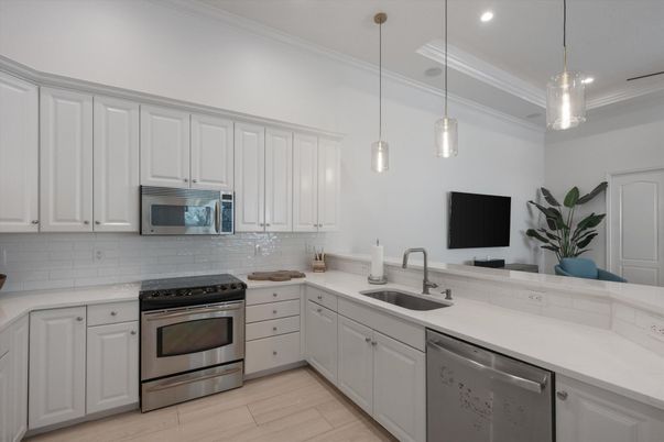 Interior, Kitchen, Pendant Lights, Recessed Lighting, Stainless Steel Appliances, Wood Texture Flooring