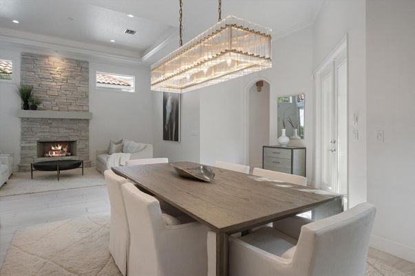 Chandelier, Dining room, Fireplace, Interior, Living room, Pendant Lights, Recessed Lighting, Stone Walls