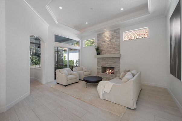 Fireplace, Interior, Living room, Recessed Lighting, Stone Walls, Wood Texture Flooring
