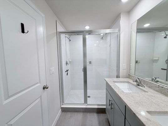 Bathroom, Dual Sink Vanities, Glass Shower, Interior, Recessed Lighting, Wood Texture Flooring