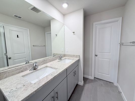 Bathroom, Dual Sink Vanities, Interior, Recessed Lighting, Wood Texture Flooring