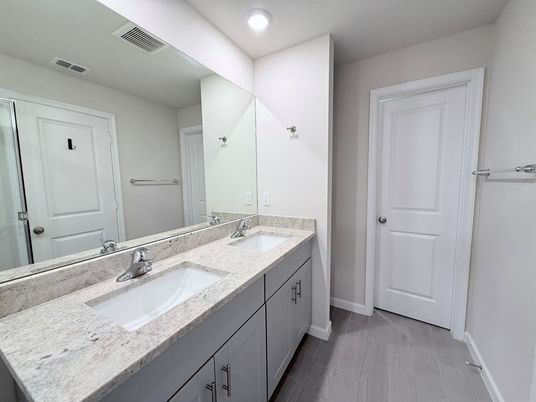 Bathroom, Dual Sink Vanities, Interior, Recessed Lighting, Wood Texture Flooring
