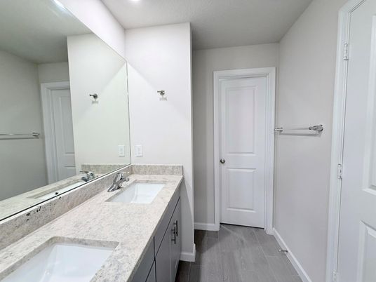 Bathroom, Dual Sink Vanities, Interior, Recessed Lighting, Wood Texture Flooring