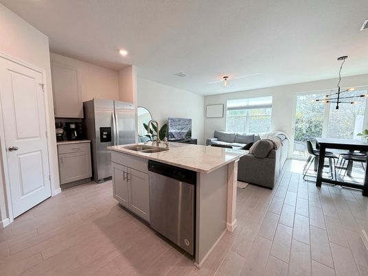 Dining room, Interior, Kitchen, Living room, Pendant Lights, Recessed Lighting, Stainless Steel Appliances, Wood Texture Flooring