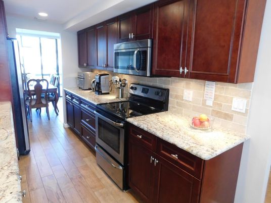 Dining room, Interior, Kitchen, Recessed Lighting, Stainless Steel Appliances, Wood Texture Flooring