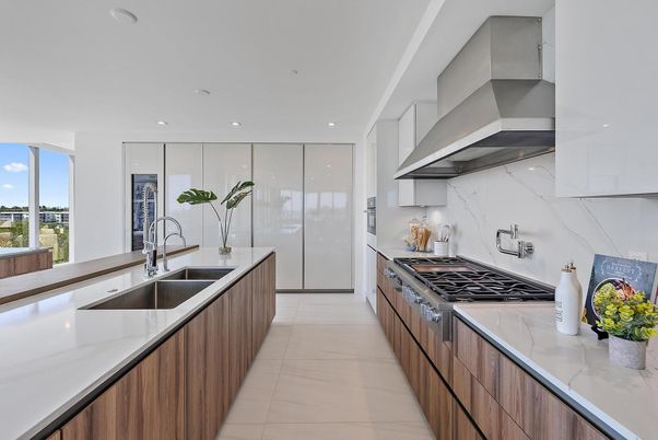 Interior, Kitchen, Marble Walls, Recessed Lighting, Stainless Steel Appliances