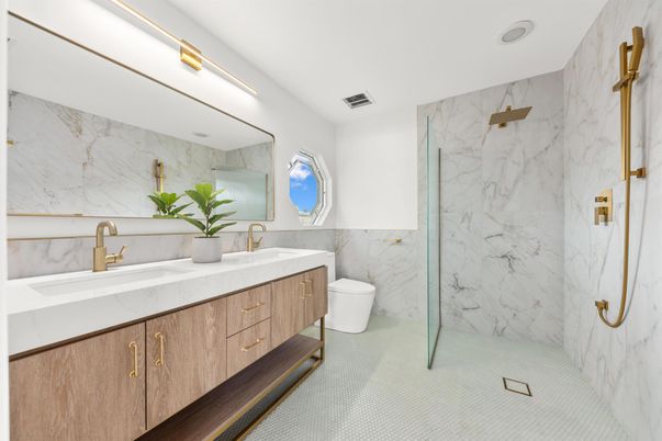 Bathroom, Dual Sink Vanities, Glass Shower, Interior, Marble Walls