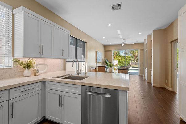 Dining room, Interior, Kitchen, Recessed Lighting, Stainless Steel Appliances, Wood Texture Flooring