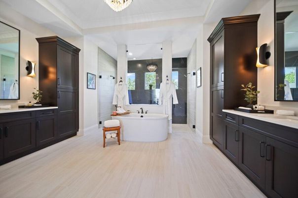 Bathroom, Dual Sink Vanities, Free Standing Baths, Interior, Pendant Lights, Recessed Lighting, Wood Texture Flooring