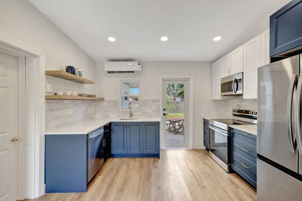 Interior, Kitchen, Recessed Lighting, Stainless Steel Appliances, Wood Texture Flooring