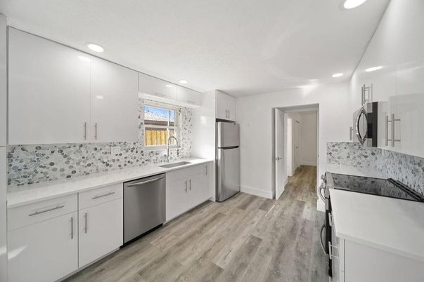 Interior, Kitchen, Recessed Lighting, Stainless Steel Appliances, Wood Texture Flooring