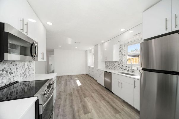 Interior, Kitchen, Recessed Lighting, Stainless Steel Appliances, Wood Texture Flooring