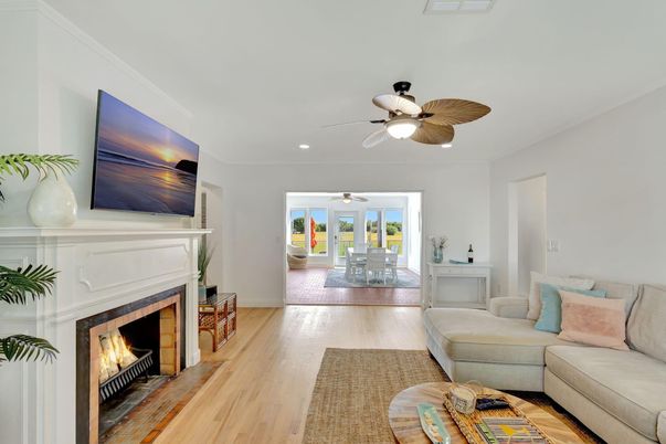 Dining room, Fireplace, Interior, Living room, Recessed Lighting, Wood Texture Flooring