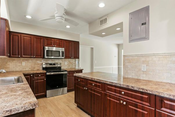Interior, Kitchen, Recessed Lighting, Stainless Steel Appliances, Wood Texture Flooring